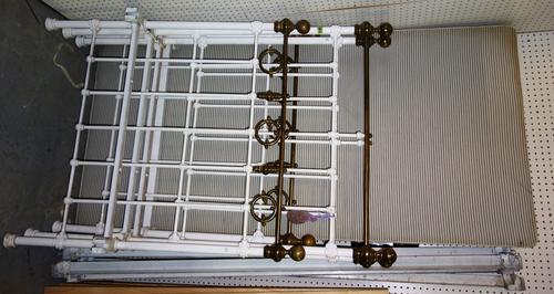 A pair of white painted single beds, circa 1900, with side rails and box bases, 90cm wide (2).