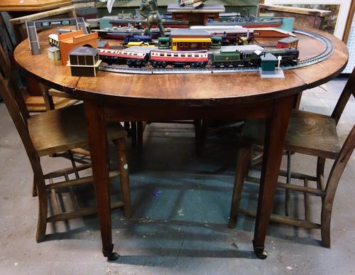 A large 19th century mahogany drop flap table.