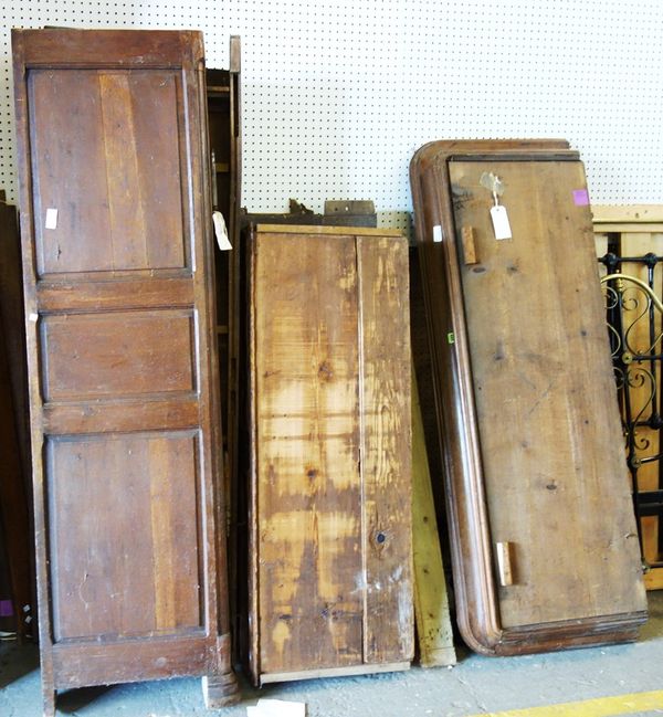 A late 18th/early 19th century French oak armoire, with a pair of shaped fielded panel doors above a carved drawer, 169cm wide (Disassembled)