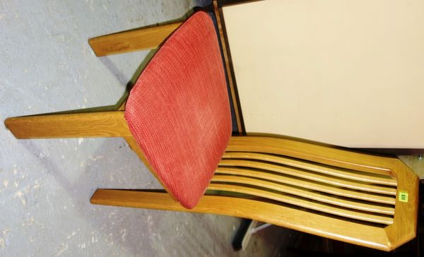 A set of six 20th century oak stick back dining chairs (6).