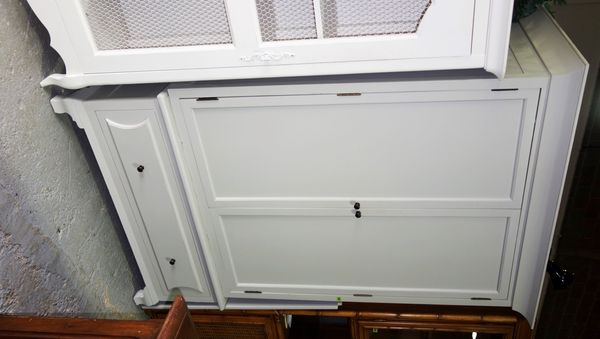A 20th century grey painted wardrobe 127 cm wide.