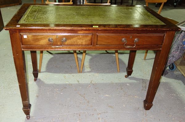 A late 19th century mahogany writing desk, with inset gilt tooled leather top over two frieze drawers, on tapering square supports, 107cm wide.