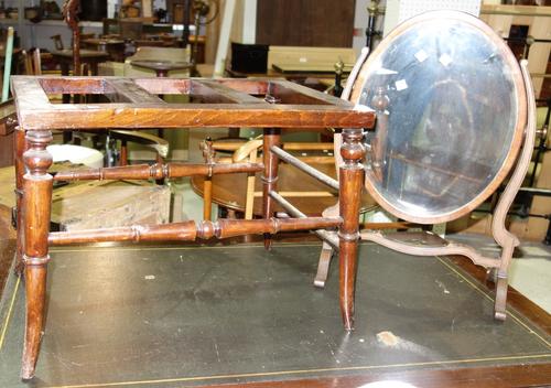 A 19th century oak luggage stand and a mahogany swing frame toilet mirror, (2)
