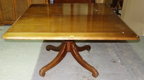 A George III mahogany breakfast table, the rectangular top on turned column and four downswept supports, 146cm x 126cm.