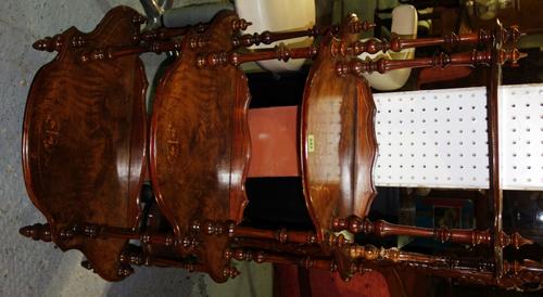 A 19th century walnut and inlaid semi elliptic four tier whatnot.
