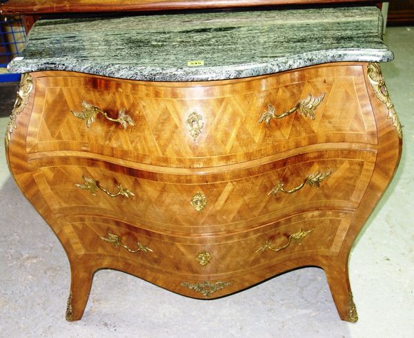 A 20th century walnut bombe shape commode with gilt metal mounts and marble top, 91 cm wide.
