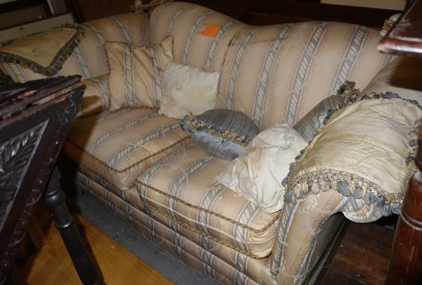 A 20th century peach and blue upholstered drop end sofa.