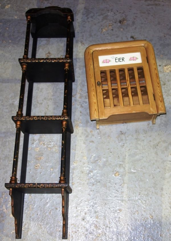 A 20th century ebonised and gilt hanging three tier shelf and a small pine egg cupboard. (2)