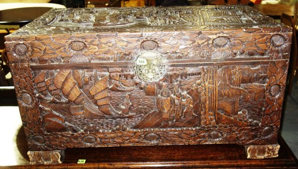 A 20th century Chinese carved camphor wood trunk.