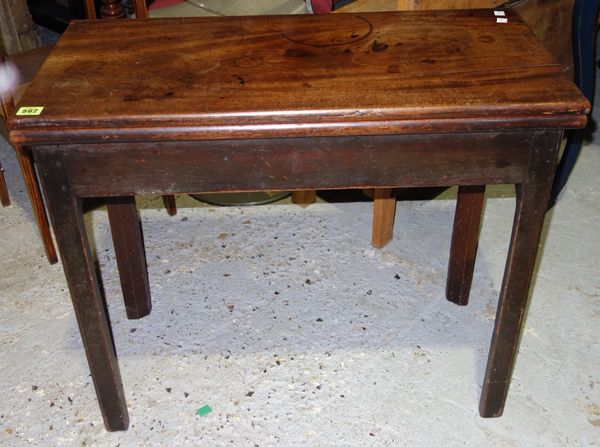 A 19th century mahogany fold over tea table 79 cm wide.