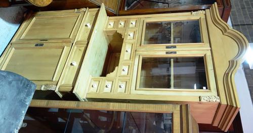 A 20th century pine dresser, with glazed top section and an arrangement of drawers.