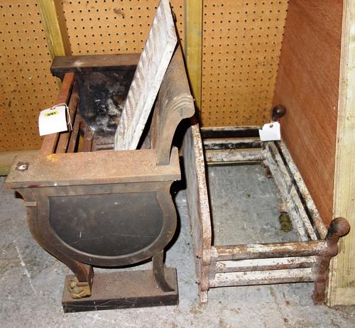 A cast iron fire basket and another. (2)