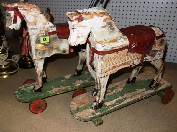 A pair of miniature horse toys. (2)