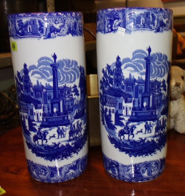 A pair of 20th century blue and white cylindrical pottery stick stands. 43 cm tall  (2)