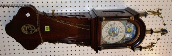 A 20th mahogany and metal mounted wall clock.