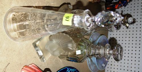 A quantity of 20th century glassware including a pair of Czechoslovakian frosted glass bookends formed as doves and a group of decanters. (qty)