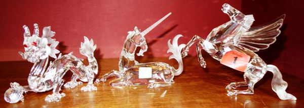 A group of three 20th century Swarovski crystal 'Fabulous Creatures' models, all boxed; 'The Pegasus', 'The Dragon' and 'The Unicorn'. (3)