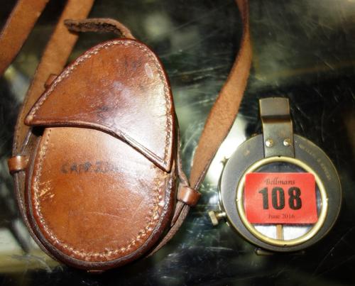 A Cruchon & Emos military compass in a leather case. (1)