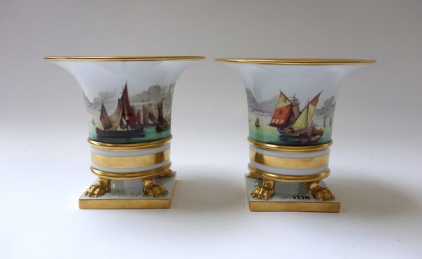 A pair of Herend porcelain vases, late 20th century, each decorated with Continental shipping scenes over a gilt band and lions paw feet, on a square