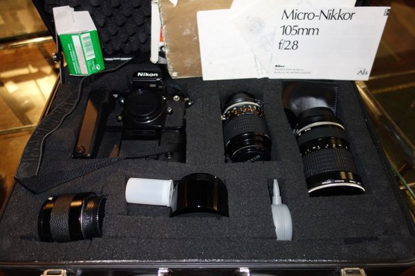 A Nikon F3 camera, with assorted lenses. (qty)