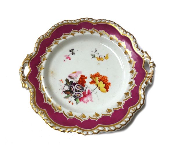 A Ridgway porcelain part dessert service, circa 1825, painted with groups of flowers inside a deep pink border and gadroon-moulded rim, comprising; tw