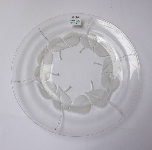 A set of twelve Lalique clear and frosted glass plates, mid 20th century, with leaf design, signed 'Lalique', 19.5cm diameter, and two larger matching