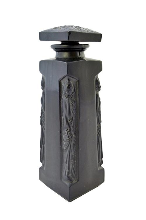 A Lalique black glass Flacons perfume bottle and stopper, 'Ambre D'Orsay', circa 1913, the tapering square bottle moulded to the corners with classica
