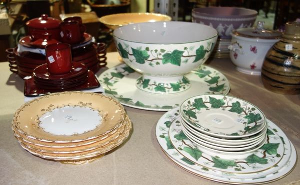 A quantity of ceramics, including a Wedgwood Napoleon Ivy punch bowl, a 20th century red ceramic part dinner service and sundry. (qty)