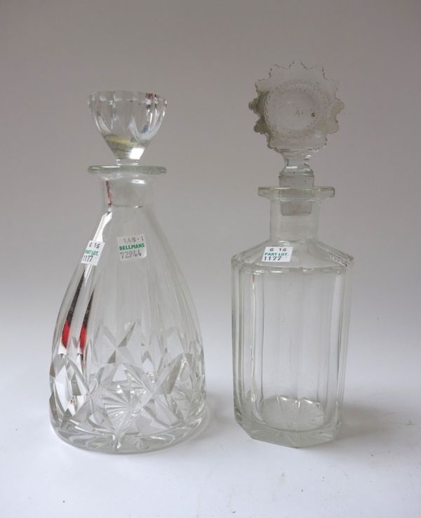 Twelve 19th century cut glass decanters and stoppers (some stoppers matched), the largest 30cm high. (12)