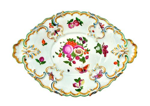 A Chelsea porcelain silver shaped oval dish, circa 1760-65, set with shell moulded handles, painted, possibly in the workshop of James Giles, with fru