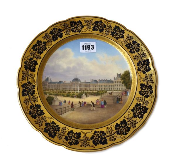 A Boyer Paris, porcelain plate, second half 19th century, painted with a view of the Louvre from the Tulieries garden, against a gilt ground decorated