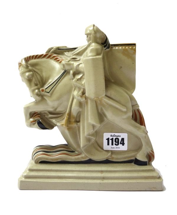 Harold Brownsword for Carter Stabler Adams; a pottery figure of a knight on horseback, early 20th century, on a stepped rectangular base, olive green,