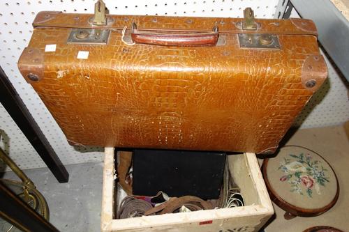 A quantity of mainly early 20th century leather belts and sundry leather items. (qty)
