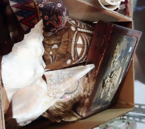 A group of 20th century tribal style carved masks, together with an Oriental lacquer box and assorted shells. (qty)