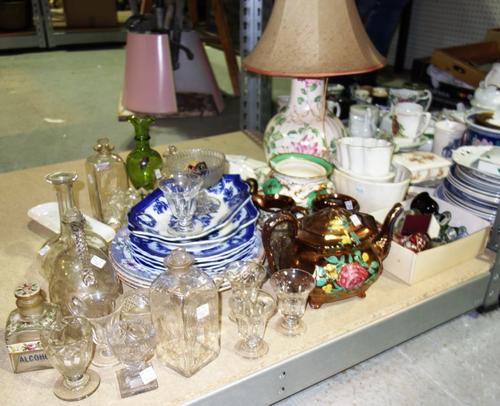 A quantity of ceramics, including a 19th century glass copper lustre teapot, blue and white plates, jelly moulds and sundry. (qty)