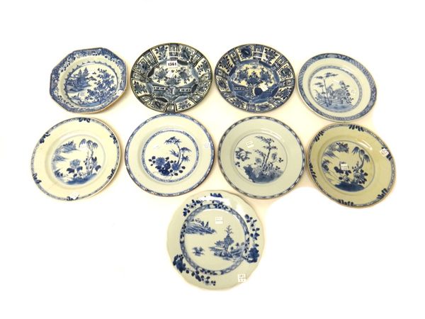 Two Arita blue and white plates, Edo period, circa 1700, each painted in kraak porcelain style with a central vase of flowers inside a panelled border