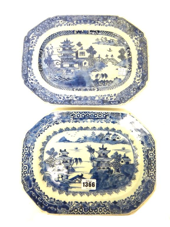 Two Chinese blue and white canted rectangular dishes, Qianlong, each painted with a riverscape with islands and figures crossing bridges, 28.5cm. wide