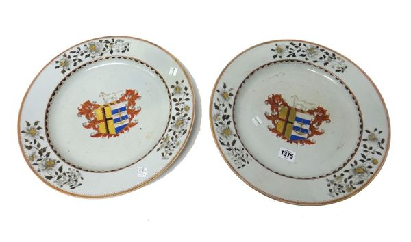 A pair of Chinese armorial dishes, Qianlong, each painted with a central coat of arms, the border painted in grisaille and gilt with three sprays of f