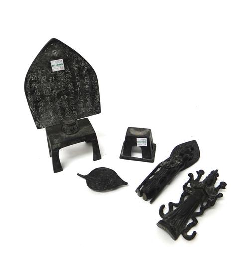 A Chinese bronze stele, cast with three Buddha's standing before a flaming aureole, each with right hand in abhaya mudra and the left hand in varada m