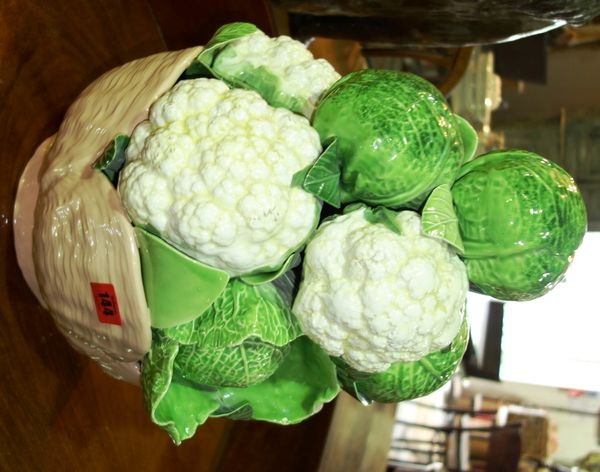 A large pottery centrepiece modelled as a cauliflower and cabbages, approx 45cm high.