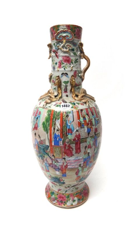 A large Canton famille rose vase, 19th century, the ovoid form with cylindrical neck, painted each side with a large figurative panel against a ground