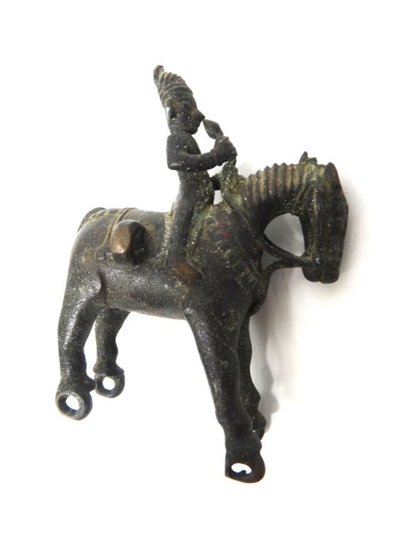 An Indian bronze toy figure of a horse and rider, late 18th/early 19th century, (a.f), 15cm. high.