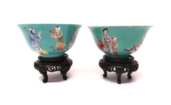 A pair of Chinese famille-rose bowls, each painted on the exterior with a band of figures against a turquoise ground, iron-red Jiaqing seal marks, (a.