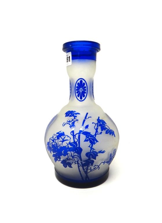 A blue overlay glass bottle vase, late 19th/20th, decorated with bamboo and foliate panels, 25.5cm.high.