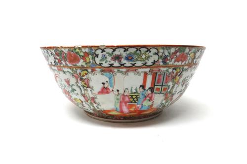 A Canton famille-rose bowl, mid 19th century, painted with panels of figures and birds in flowering branches, (a.f),  33.5cm.diameter.