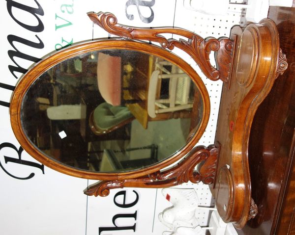 A Victorian mahogany oval swing frame dressing mirror,  aprox 75cm x 75cm.