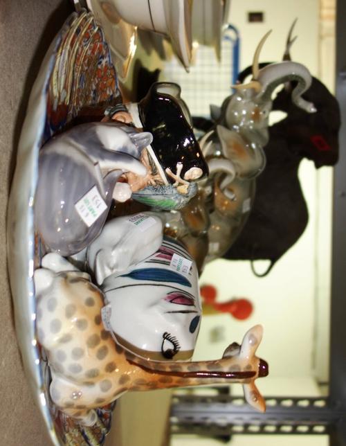 A quantity of porcelain animals, including 'The Patriarch', limited edition, Royal Dux elephants, Lladro, a Royal Doulton Toby jug and sundry. (qty)