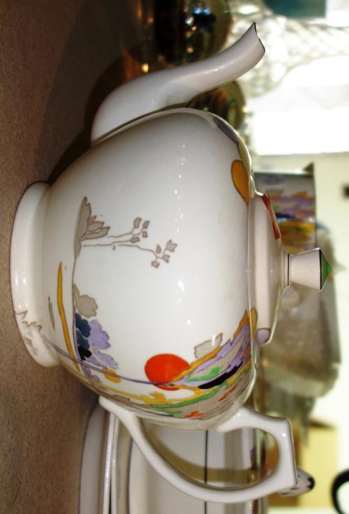 A Tams Ware pottery part dinner and tea service in the 'Woodland' pattern, of Clarice Cliff design. (qty)
