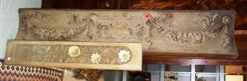 A large carved panel depicting floral swags, and a hardwood pierced panel. (2)