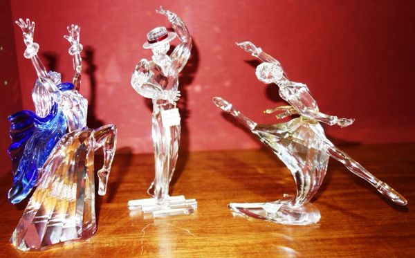 A group of three 20th century Swarovski crystal 'Magic of Dance' models; 'Anna 2004', 'Isadora 2002' and 'Antonio 2003'. (3)